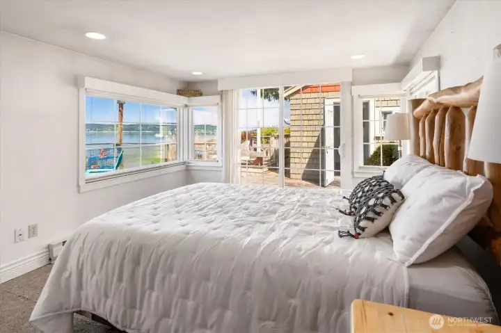 The bedroom features sliders that lead to the deck— views in bed, anyone? The bedroom features sliders that lead to the deck— views in bed, anyone?