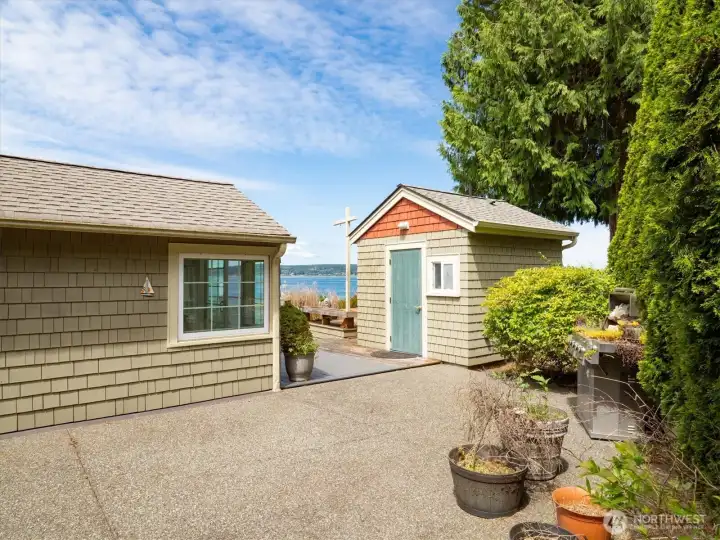 A patio at the back side of the cabin doubles your entertaining options for those glorious sunny PNW days. A patio at the back side of the cabin doubles your entertaining options for those glorious sunny PNW days.