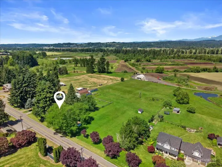 Sprawling mostly level acreage with stunning Cascade views! Privacy, fenced, great for dogs, horses, goats and more.