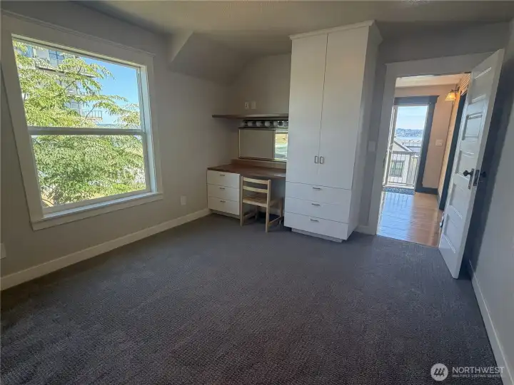 Primary bedroom with large windows and views! Primary bedroom with large windows and views!