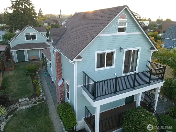 Front f the home showcasing the double decks and ADU in the back! Front f the home showcasing the double decks and ADU in the back!