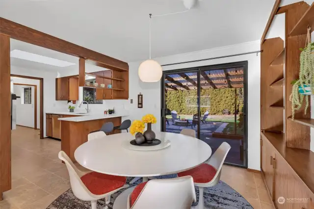 Dining area leading out to backyard