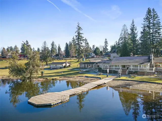 Cherokee Bay Club House with the dock and swimming area.