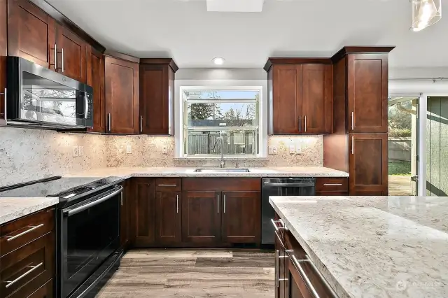 If you are looking for a kitchen that is great for working space you will find it here. This kitchen has lots of cabinet storage and working space to allow you to prep, cook, and serve in style.