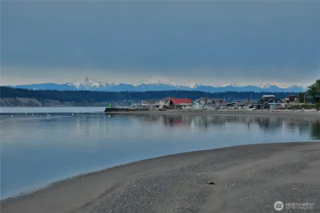 Mountain views and sandy beaches as the tide goes out
