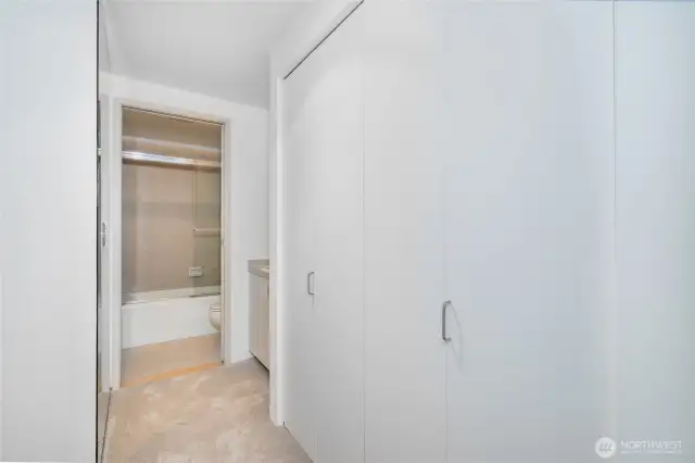 Entry to the en-suite bathroom, complete with generous closet space.