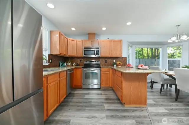 Kitchen is great sized with wonderful cabinet and counterspace.
