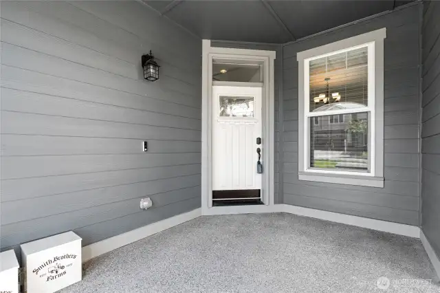 Beautiful entry and porch, big enough for a couple of chairs to enjoy your morning coffee!