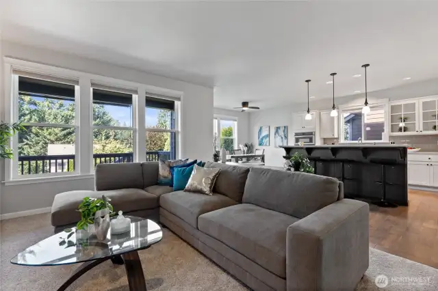 Lots of windows to let in the light! The kitchen and eating nook are directly behind.