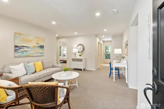 This spacious rec room serves as a central hub for the home's three additional bedrooms and a full bathroom - perfect as a kids’ zone, teen lounge, or casual hangout space. All bedrooms are generously sized and feature California Closet systems for smart storage. this home is well-suited for multi-generational living with its flexible layout and private wing configuration.