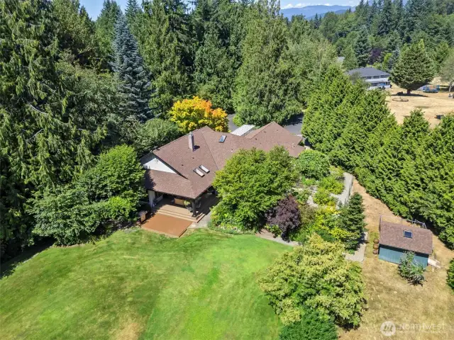 This home and property offer a rare and fantastic combination: a one-level residence in a private, nature-filled setting with quick access to I-5, plus room for RVs, animals, and more. Designed for comfort and flexibility, it’s equally suited for quiet everyday living or hosting everything from game nights and backyard BBQs to large-scale entertaining.