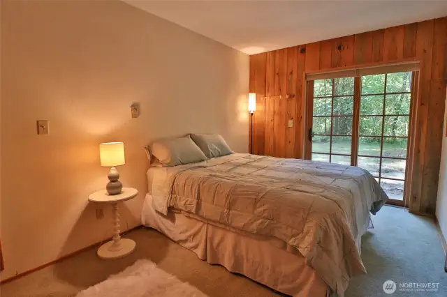 Primary bedroom with your own private doors to the outside.