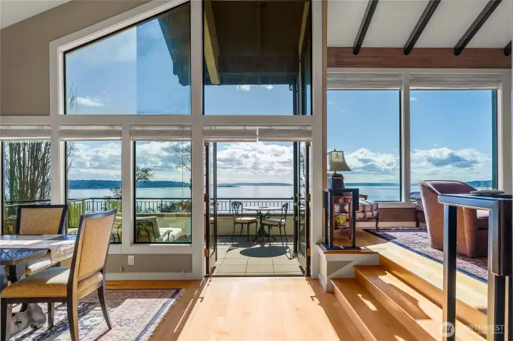 Welcome home to these stunning Puget Sound views!   One could sit all day and enjoy the world float, steam and fly by. Experience this incredible protected panoramic vista of the Pacific Northwest while living in the city!  Unobstructed views, privacy and serenity.  City of Seattle to the East, Mt .Rainier, Alki and the Olympic mountain range...all at your feet!  This rare view is protected in perpetuity... Come see where the Puget Sound meets the sky and the beauty of the Pacific Northwest is on full display.