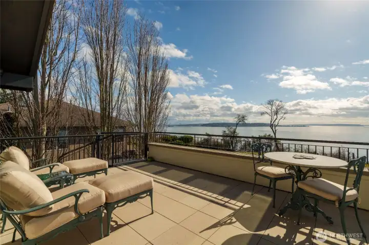 This private deck is just off of the dining room. Wonderful space to entertain and to watch the world go by.