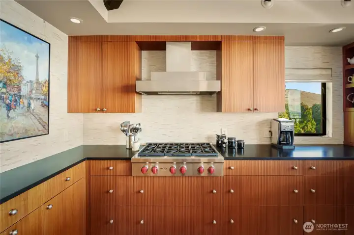 Notice the beautiful Rosewood custom cabinetry.