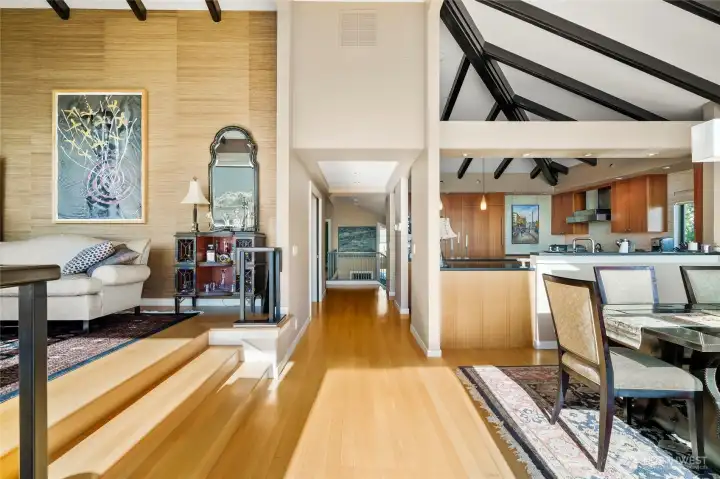 As one returns from the private view deck, this is the orientation of the living room, dining room and the kitchen.