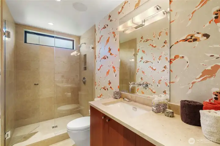 Guest bath upstairs, adjacent to the library.