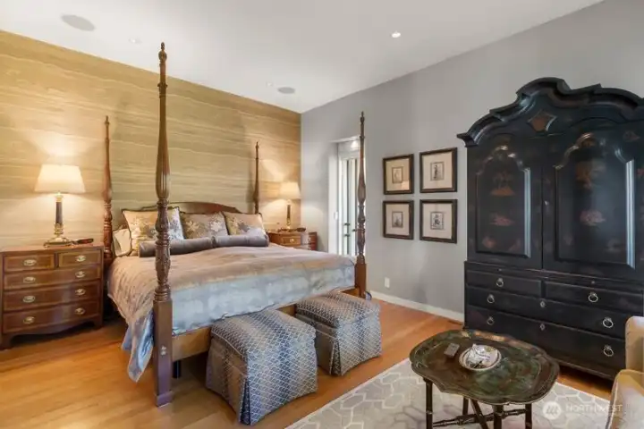 The primary suite is done in quiet colors and features blackout curtains.