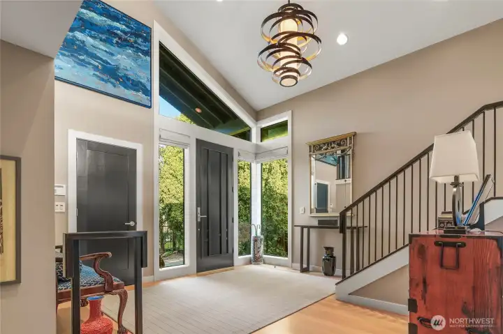 As one enters the home, the formal entry is light, bright and spacious. This is the view as one comes up the staris from the family room.