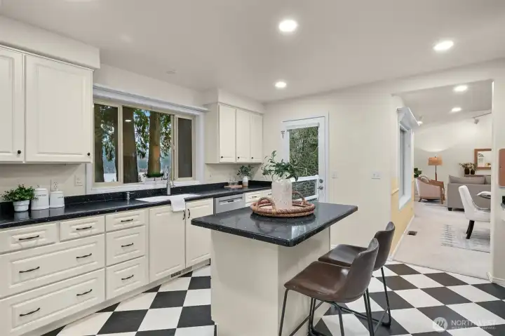 A breakfast bar offers and eat-in option for Sunday morning pancakes.