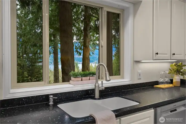 The thoughtful layout offers lake views from every room in the house.