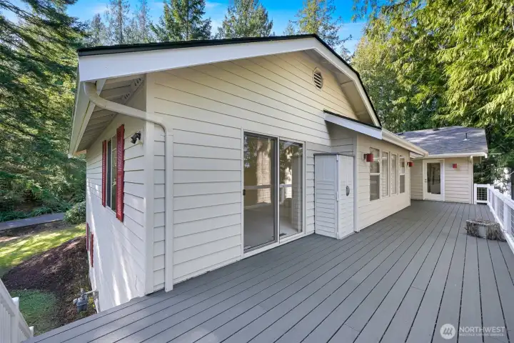 Deck access from kitchen and primary suite