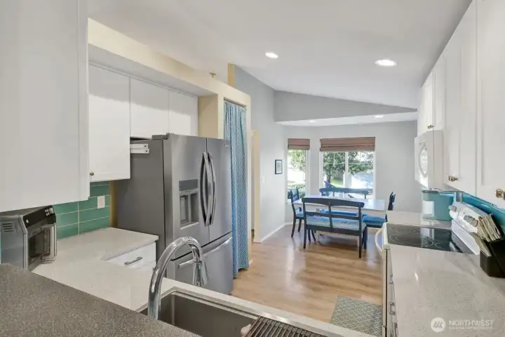 View from family room into kitchen.