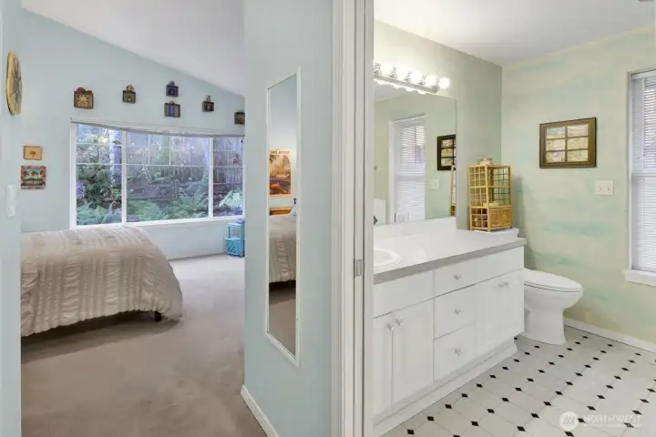 Entry to Primary Suite with walk in closet and bath.