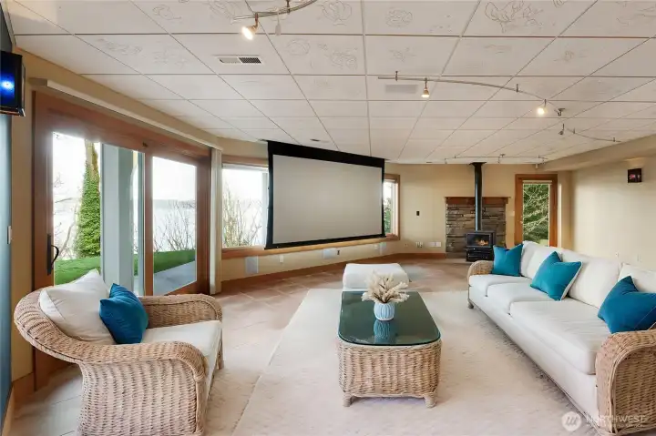 Virtually staged photo. Projector screen retracts for view Virtually staged photo. Projector screen retracts for view