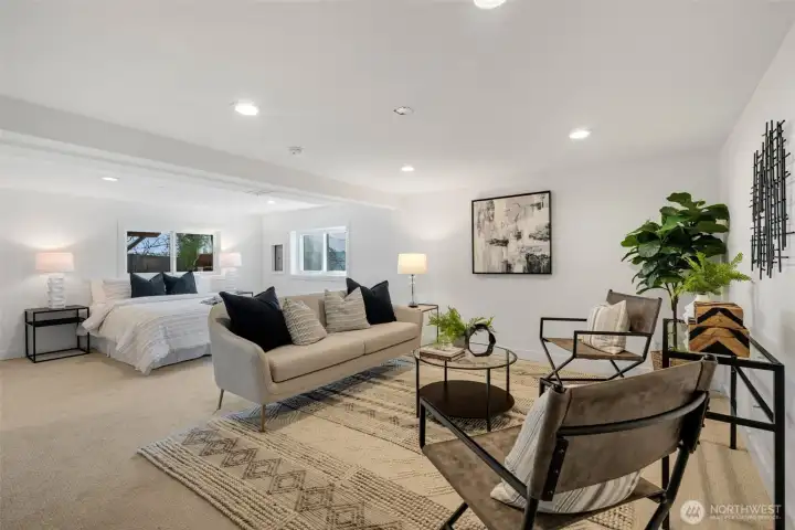 The large lower-level bedroom with new carpet and en-suite ¾ bath offers great flexibility