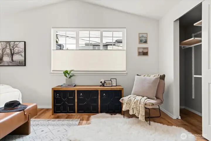 Large closet in primary bedroom with built-ins.