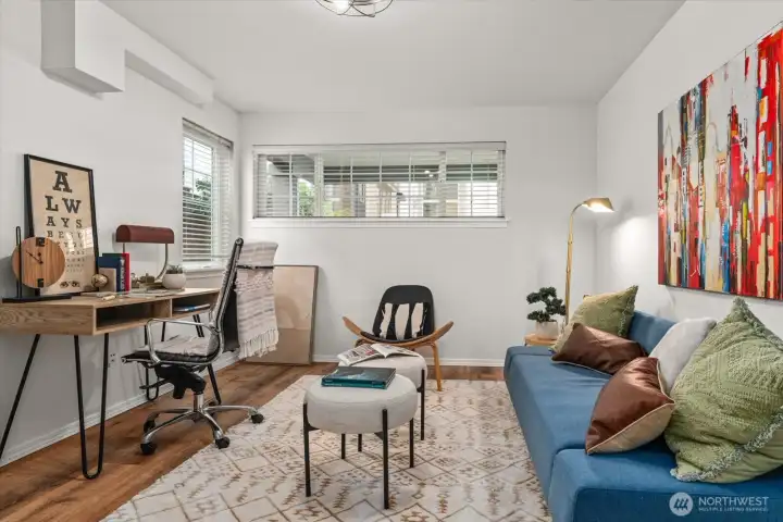 Main floor bonus room with closet, can be office, bedroom or den.