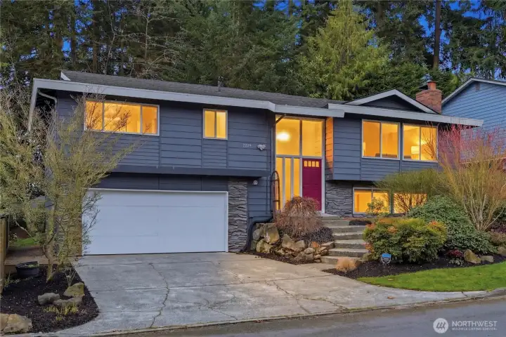 Great curb appeal with front yard landscaping.