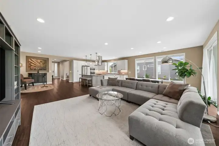 Great room with kitchen and entry in the background