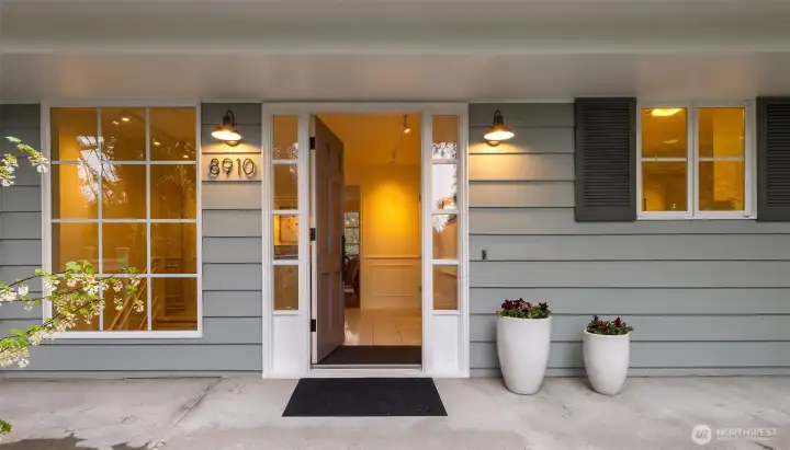 The front door invites you inside to a spacious foyer.