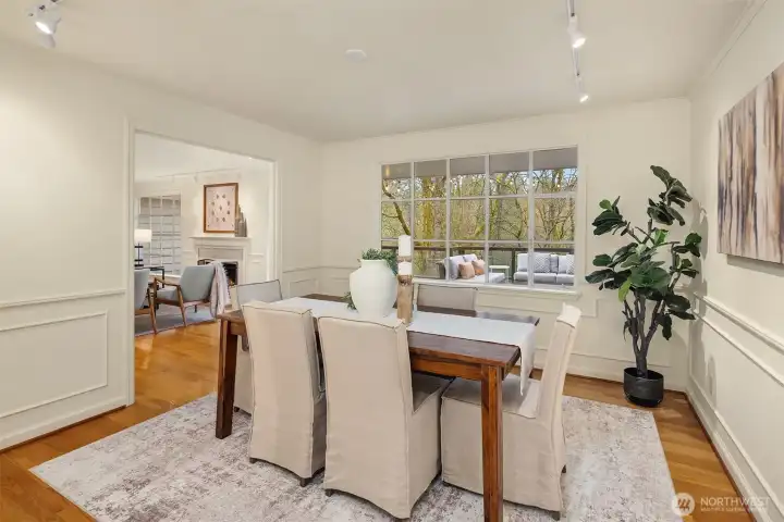 The formal dining room has plenty of room and stunning backyard views.