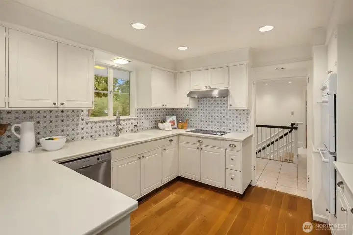 The updated chef's kitchen offers tons of storage and counter space.