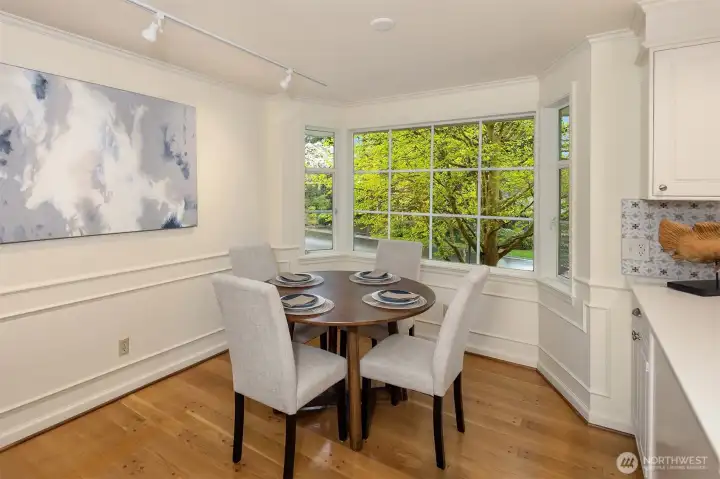 Serene views embrace the casual dining space.