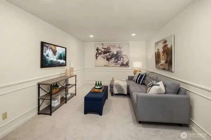 A media room tucked off the family room is the perfect spot for movies and video games!