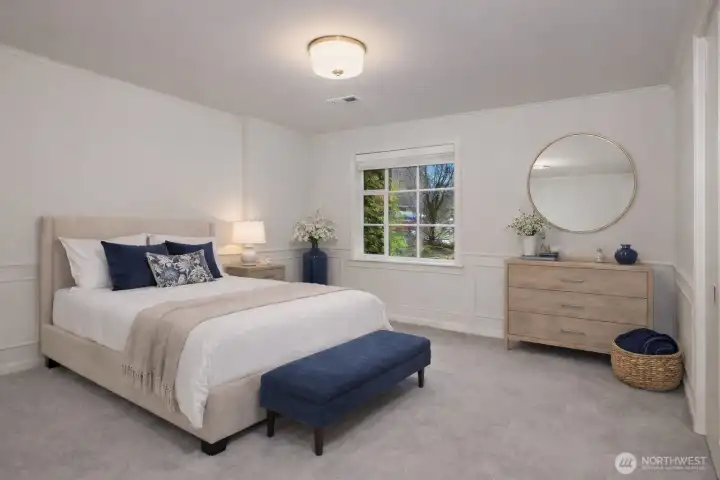 *Virtually Staged* This downstairs bedroom offers picturesque garden views and plenty of room.