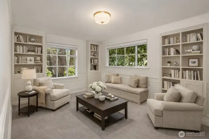 *Virtually Staged* The second downstairs bedroom features corner windows ... perhaps a perfect reading room?!