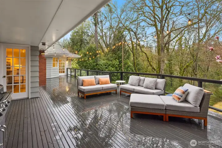 The backyard deck offers plenty of space for relaxing and entertaining.