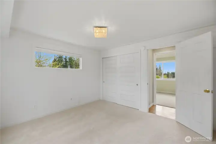 Large primary bedroom with double closet.