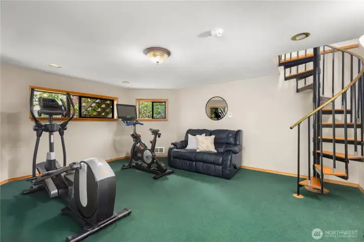 It’s also accessible via the spiral staircase off of the sunroom.