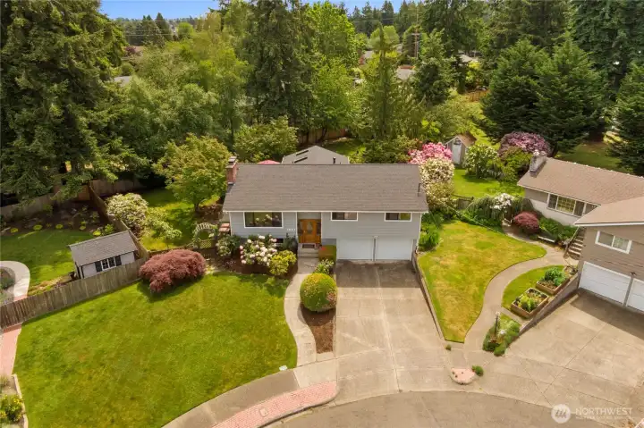 Pristine landscaping on an oversized lot. The roof was replaced in 2014.