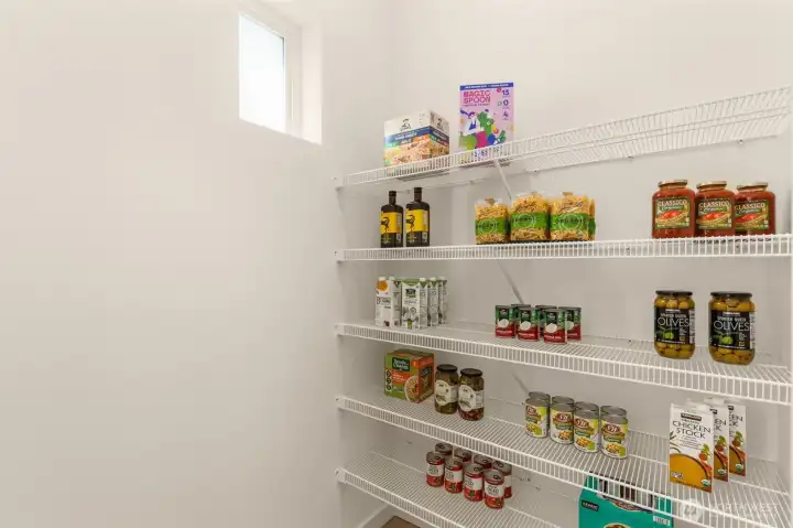 Walk-in Pantry too!! Photo is of model home of same floorplan. Color schemes and finishes will vary per plan. Walk-in Pantry too!! Photo is of model home of same floorplan. Color schemes and finishes will vary per plan.