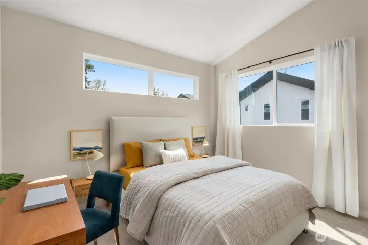 Third bedroom (staged with Queen size bed) Photo is of model home of same floorplan. Color schemes and finishes will vary per plan. Third bedroom (staged with Queen size bed) Photo is of model home of same floorplan. Color schemes and finishes will vary per plan.