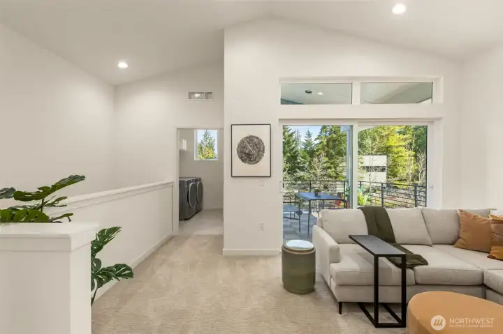 Top level family room steps out to covered deck! Photo is of model home of same floorplan. Color schemes and finishes will vary per plan. Top level family room steps out to covered deck! Photo is of model home of same floorplan. Color schemes and finishes will vary per plan.