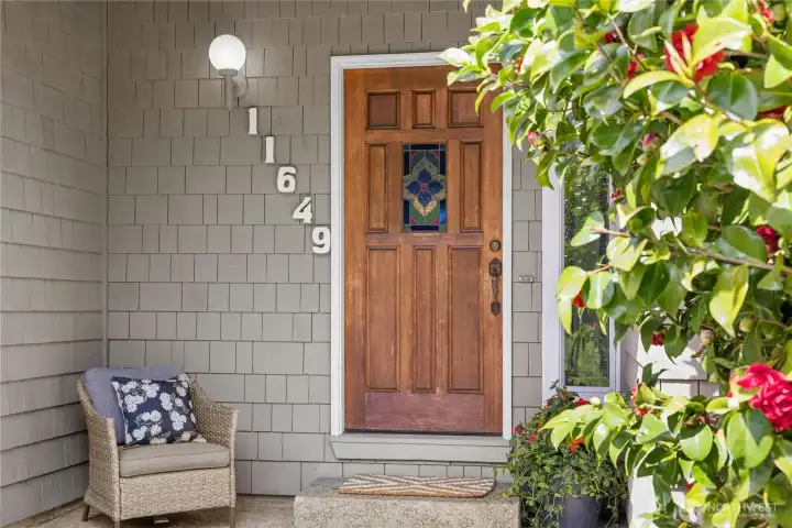 Covered front entry welcomes guests.