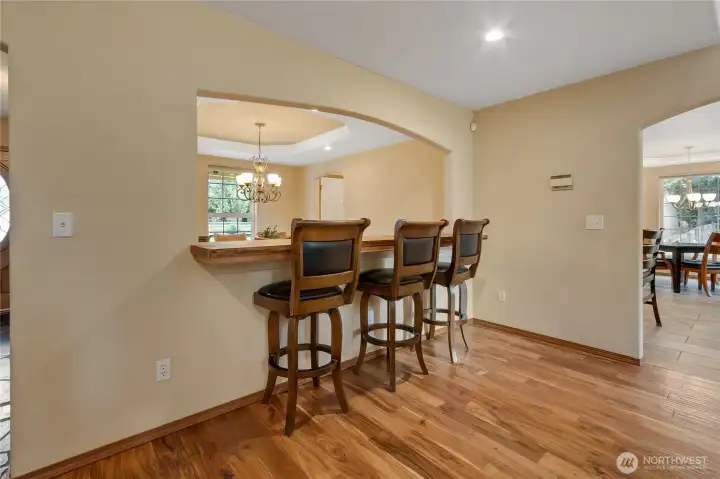 Breakfast bar with live edge counter pass through to dining room